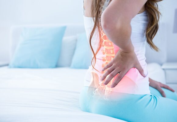 How does core strength help back pain?